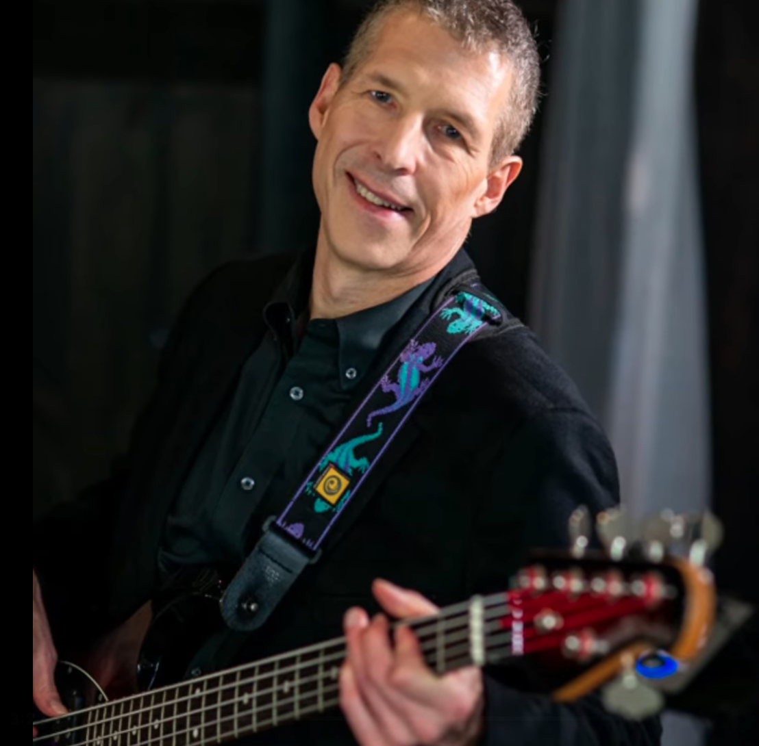 Scott on bass guitar